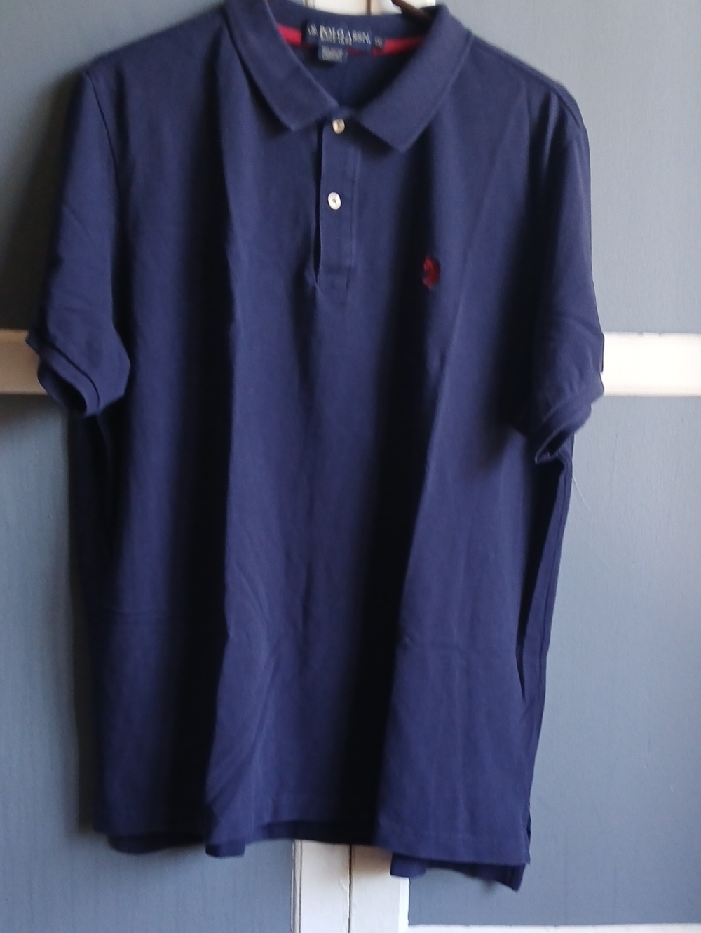 U.S. Polo Assn. Navy Blue Polo with Red Logo